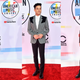 Illustration for article titled Statement Suits, Plush Pinks, and a Lotta Gowns on the American Music Awards Red Carpet